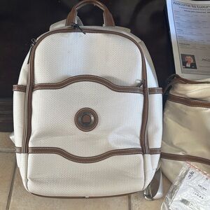 Price for 2-Cream and Brown Backpack Delsey France